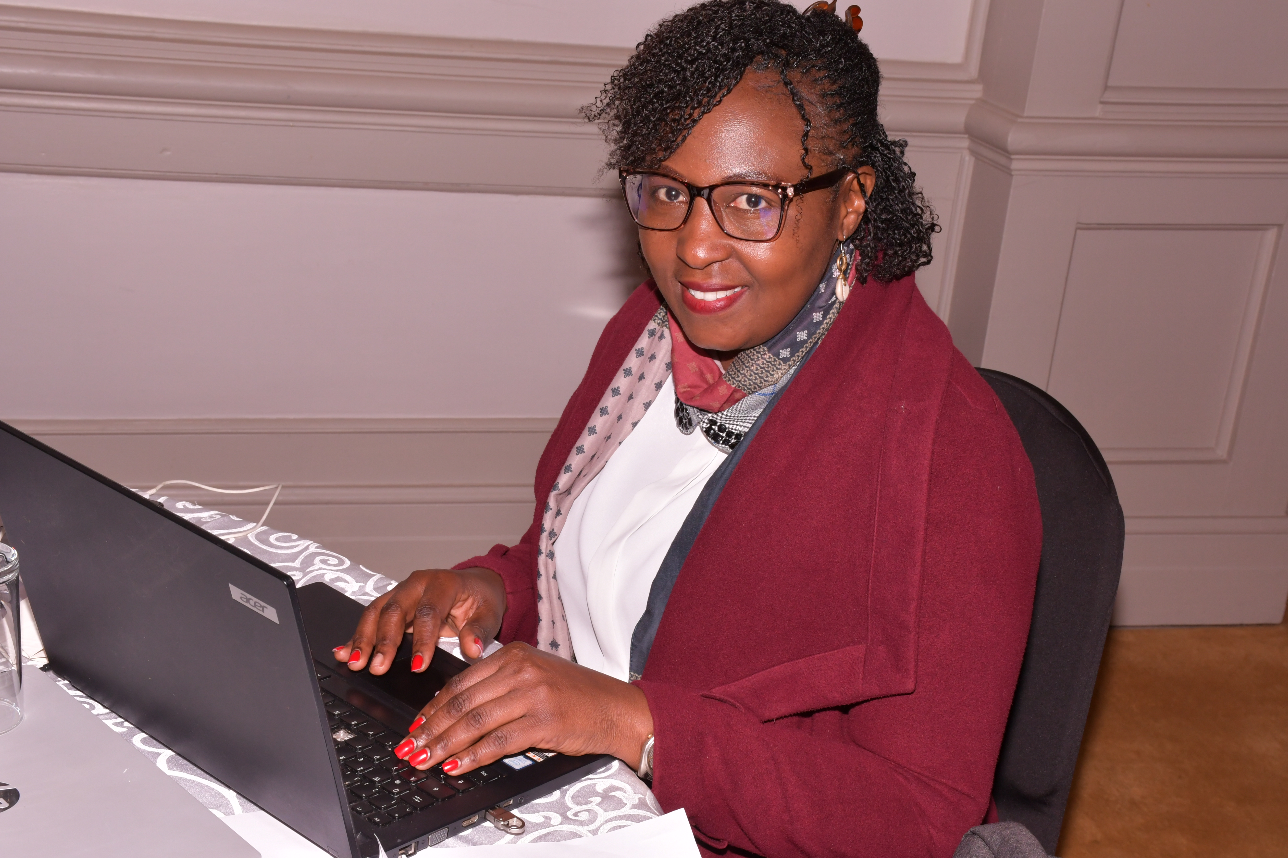 Violet Otindo - Precise Cut Media team